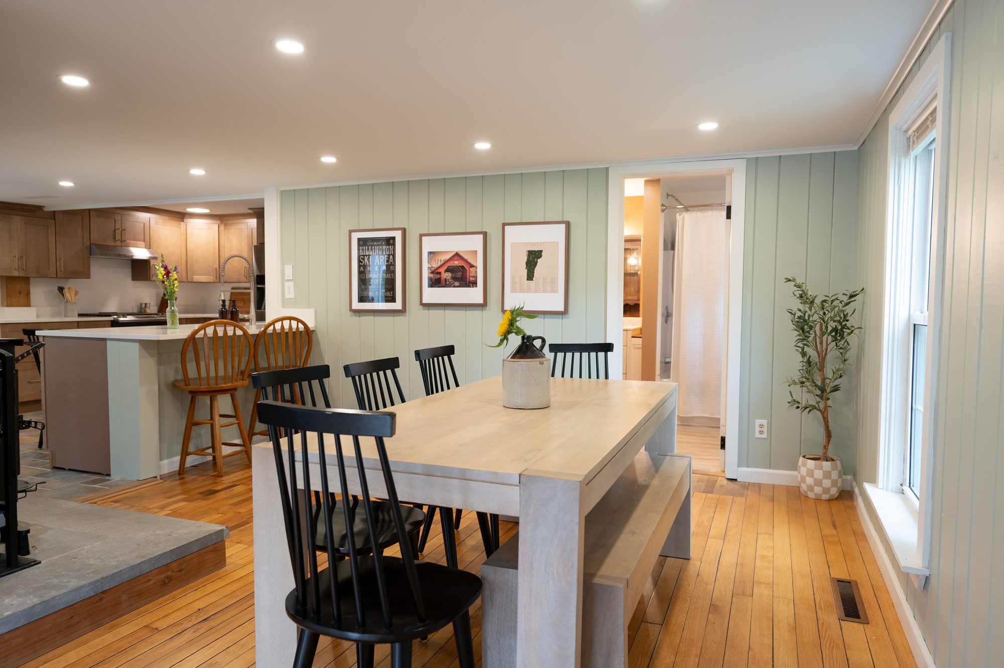 Dining area with Vermont wall art